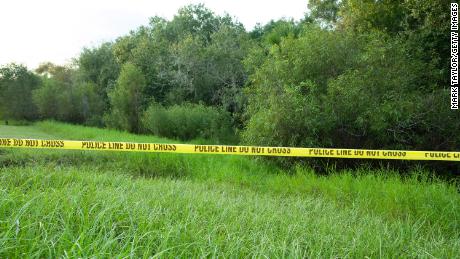 Police tape restricts access to Myakkahatchee Creek Environmental Park on October 20.