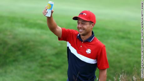 KOHLER, WISCONSIN - SEPTEMBER 26: Xander Schauffele of team United States celebrates their 19 to 9 win over Team Europe with a drink during Sunday Singles Matches of the 43rd Ryder Cup at Whistling Straits on September 26, 2021 in Kohler, Wisconsin.   (Photo by Richard Heathcote/Getty Images)