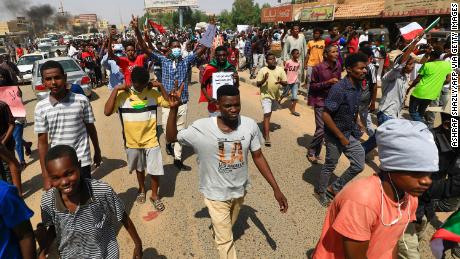 Supporters of Sudan's transitional government protested as rival demonstrators kept up a sit-in demanding a return to military rule.