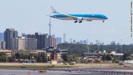 An airplane is seen landing at Toronto Pearson International Airport in Mississauga, Ontario, Canada, on Sept. 7, 2021.
