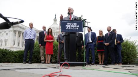 Chair of the Freedom Caucus U.S. Andy Biggs speaks as caucus members listen during a news conference in front of the US Capitol on August 31, 2021 in Washington, DC. 
