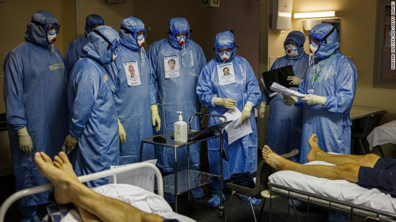 Medics work in the intensive care unit for Covid-19 patients in Moscow&#39;s Sklifosovsky emergency hospital on October 20.