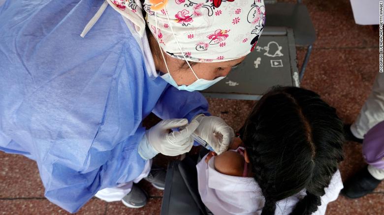 Prepare ahead of time so you can ease your child&#39;s fears about getting vaccinated.  A child receives the Covid-19 vaccine in Quito, China, October 18.