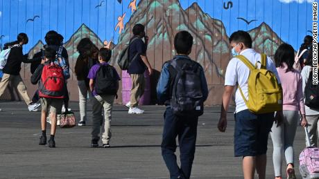 The return of in-person classes means kids may need help shaking off some social awkwardness. Students at a public middle school in Los Angeles are shown, September 10.