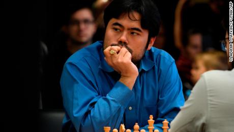 Nakamura ponders his next move during a rapid chess game at the Open World Rapid and Blitz Championships in Moscow on December 28, 2019.
