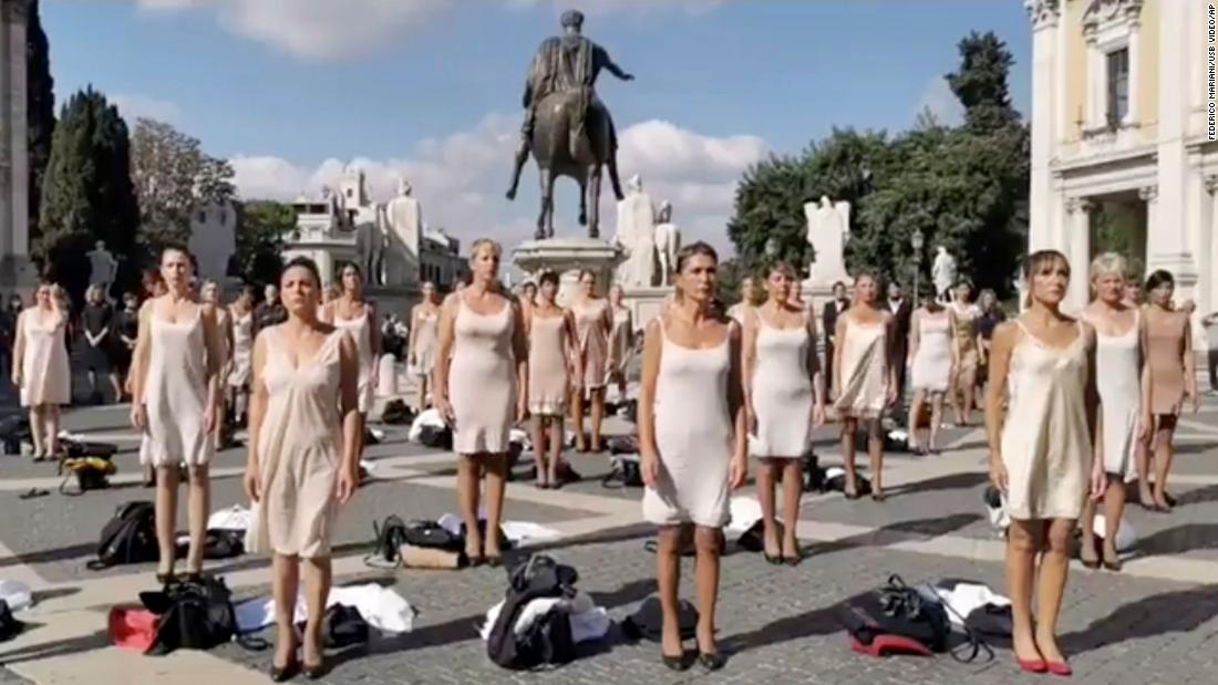 Alitalia flight attendants protest in their underwear