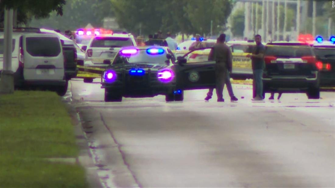 Two Doral police officers injured, suspect killed in shooting outside Miami-Dade police station