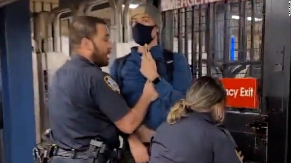 NYC mayor 'troubled' by video showing unmasked officers forcibly removing masked subway commuter