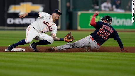 Houston Astros shortstop Carlos Correa tags out Boston Red Sox&#39;s Alex Verdugo at second to end the top of the seventh inning on Friday