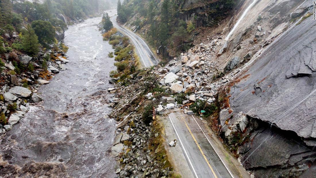 Rocks and vegetation cover Highway 70 following a landslide in Plumas County, California, on Sunday, October 24. Heavy rains blanketing Northern California created slide and flood hazards in land that has been scorched by wildfires. 