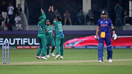 Pakistan&#39;s Hasan Ali, third left, celebrates the dismissal of India&#39;s Suryakumar Yadav during the Cricket Twenty20 World Cup match between India and Pakistan in Dubai, UAE, on October 24.