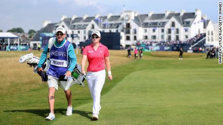 Maguire walks down the first hole with her caddie during the final day of the Women&#39;s Open at Carnoustie Golf Links.