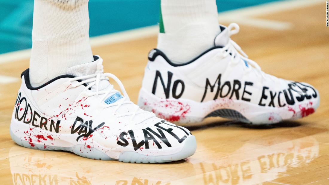 Enes Kanter says Nike is 'scared to speak up' against China and wears 'Modern Day Slavery' shoes in protest of Uyghur treatment