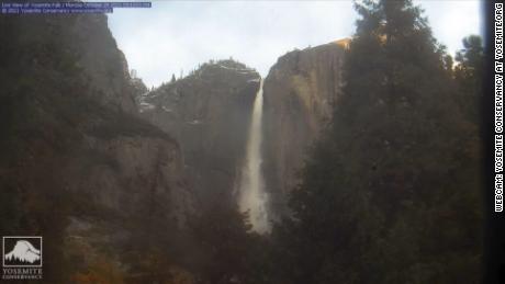 Yosemite Falls flows again Monday, a Yosemite Conservancy webcam video shows, after a major West Coast storm.