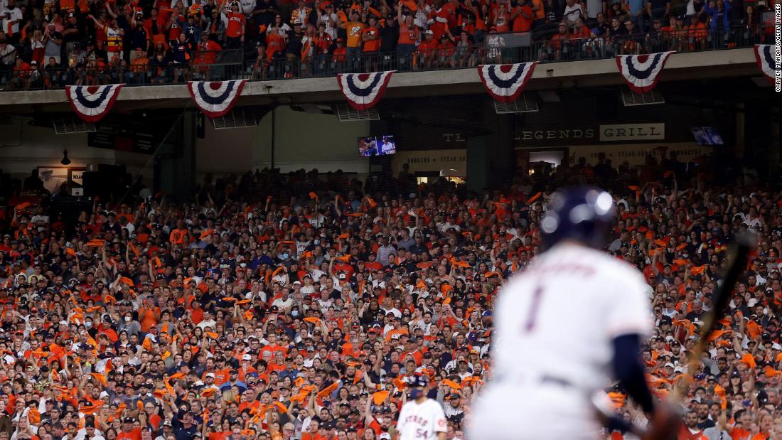 Fans watch the first inning of Game 1 in Houston&#39;s Minute Maid Park.