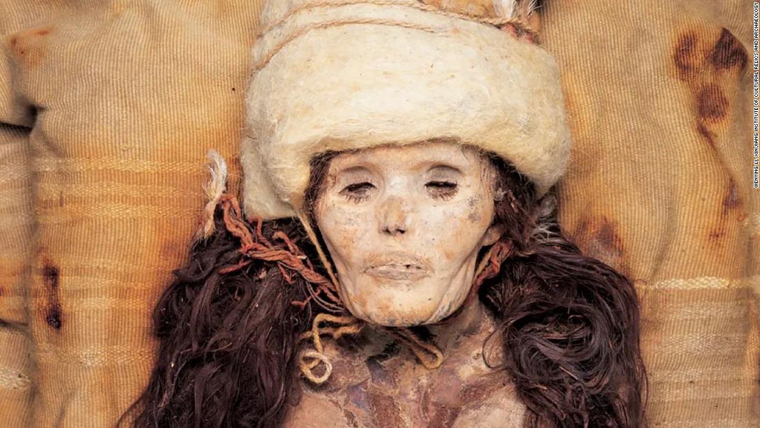 The dry desert air means the bodies are extraordinarily preserved, with hair and facial features clearly visible. 