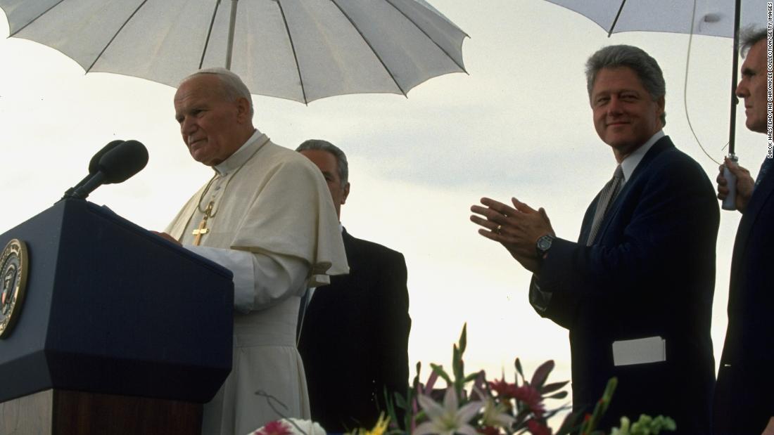 President Bill Clinton stands by as Pope John Paul II speaks at a news conference in Denver in 1993.