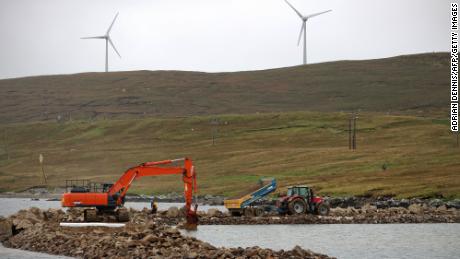 Construction takes place at Cullivoe harbor in the Shetland Islands, north of Scotland, which is increasingly turning to renewables.
