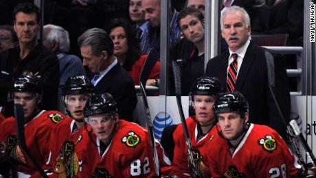 Joel Quenneville, top right, shown with the Blackhawks in 2010.