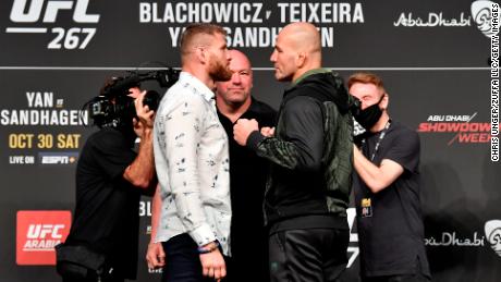Jan Blachowicz (left) and Glover Teixeira (right) face off during the UFC 267 press conference.