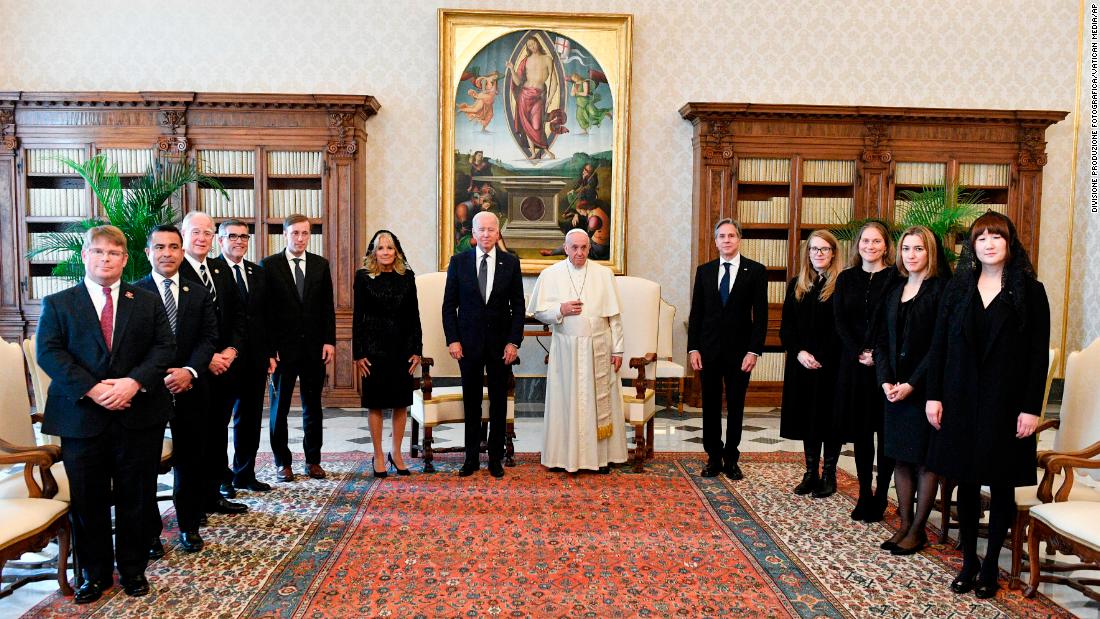 Biden, first lady Jill Biden, Secretary of State Antony Blinken and the rest of the US delegation pose for a photo with the Pope.
