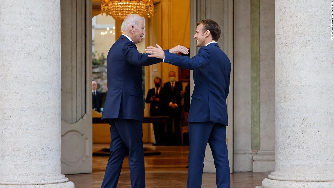 Macron welcomes Biden before their meeting at the French Embassy in Rome on Friday. During &lt;a href=&quot;https://www.cnn.com/2021/10/29/politics/macron-biden-meeting-rome/index.html&quot; target=&quot;_blank&quot;&gt;their meeting,&lt;/a&gt; Biden admitted that his administration was &quot;clumsy&quot; in its handling of the deal that deprived France of billions in defense contracts. Macron emphasized that &quot;what really matters now is what we will do together in the coming weeks, the coming months, the coming years.&quot;