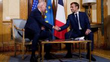 U.S. President Joe Biden, left, and French President Emmanuel Macron shake hands during a meeting at La Villa Bonaparte in Rome, Friday, Oct. 29, 2021. A Group of 20 summit scheduled for this weekend in Rome is the first in-person gathering of leaders of the world&#39;s biggest economies since the COVID-19 pandemic started.
