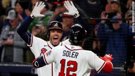 The Atlanta Braves&#39; Jorge Soler is congratulated by Freddie Freeman after hitting a solo home run against the Houston Astros in Game 4. 