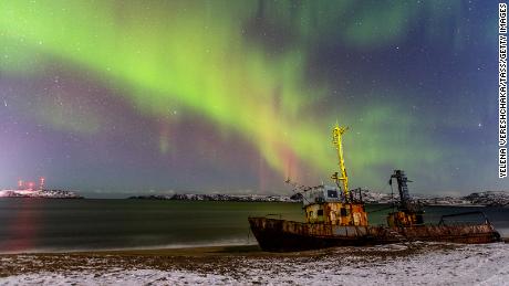 The northern lights are seen Saturday over Teriberka, a village on the Russian Arctic coast.