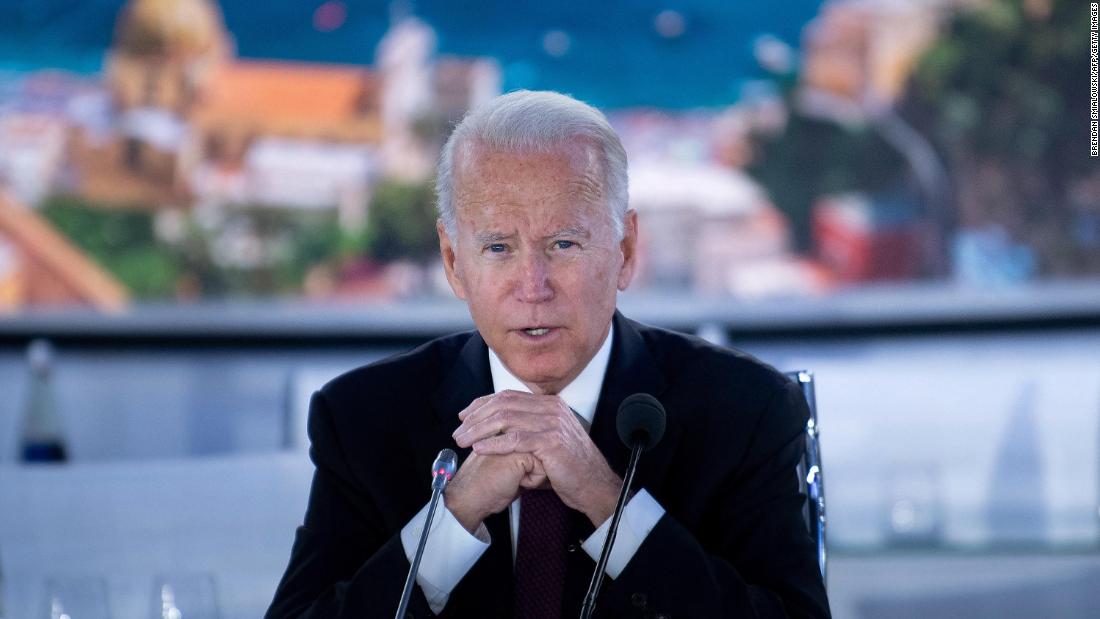 Biden speaks at the beginning of a meeting about global supply chains on Sunday.