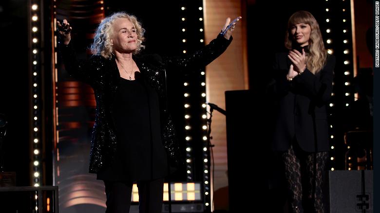 Taylor Swift pays tribute to Carole King as she serenades the Rock & Roll Hall of Fame audience