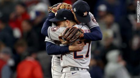 Carlos Correa and Jose Altuve of the Houston Astros celebrate the team&#39;s 9-5 win against the Atlanta Braves in Game 5.