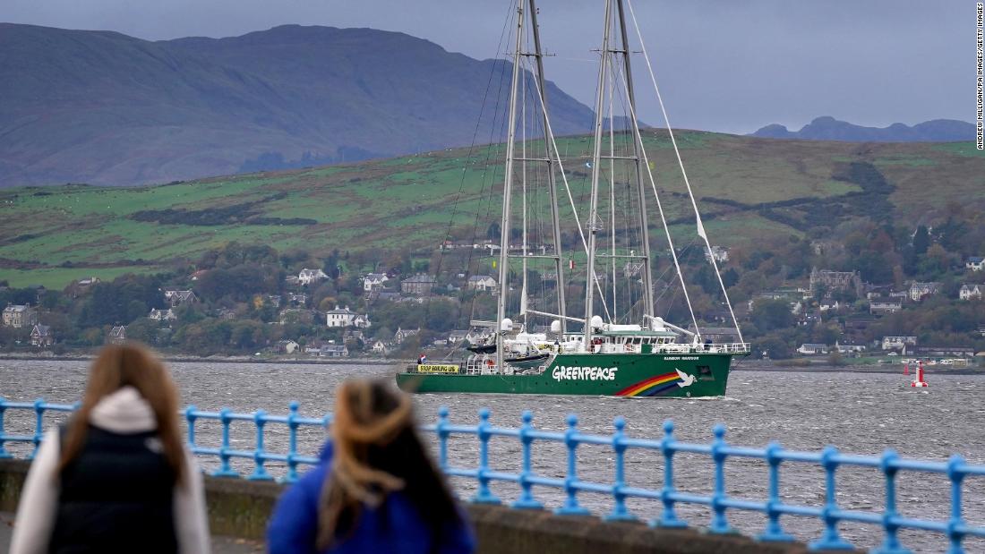 The Greenpeace ship Rainbow Warrior makes its way up the River Clyde, near Greenock, Scotland, on the first day of COP26. The ship was carrying four young climate activists from areas affected by climate change.