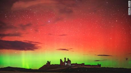 The Northern Lights were captured at Dunstanburgh Castle in Northumberland.  The rare red polar lights put on a show in the night sky.