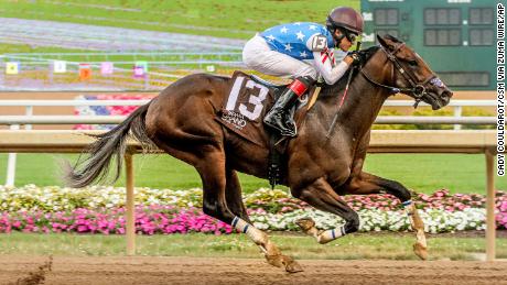 Libertyrun #13, ridden by Mena, wins a maiden special weight race on Indiana Derby Day at Indiana Grand Casino.