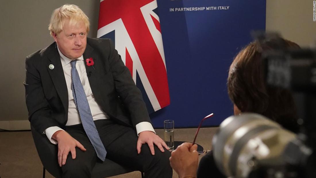 Exclusive: Boris Johnson talks up COP26 climate deals but stumbles on Attenborough mask controversy