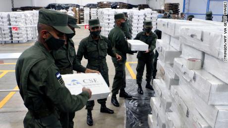 Members of Nicaragua&#39;s army prepare election ballots for their distribution throughout the country.