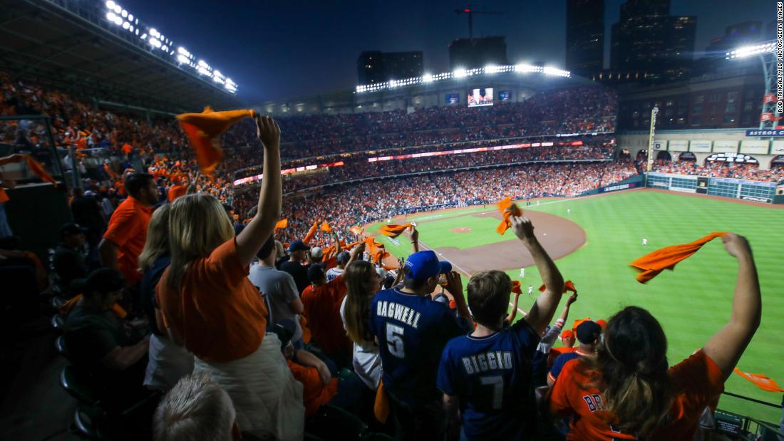 Houston Astros fans wave rally towels during Game 6 at Minute Maid Park in Houston.