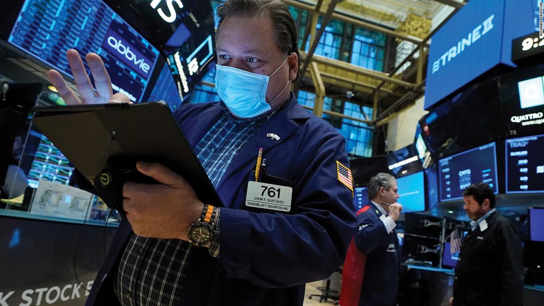 Stocks rally to new record highs on strong jobs data and Pfizer Covid pill news