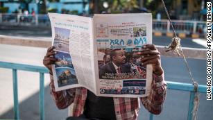 Prime Minister Abiy Ahmed on the cover of a newspaper in the Ethiopia & # 39;  s capital on November 3, a day after a nationwide state of emergency was announced.