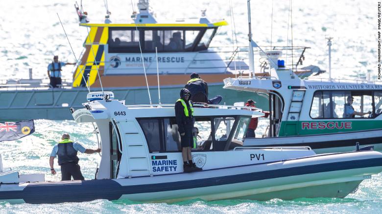 Search and Rescue vessels are seen patroling off Port Beach in North Fremantle, Western Australia