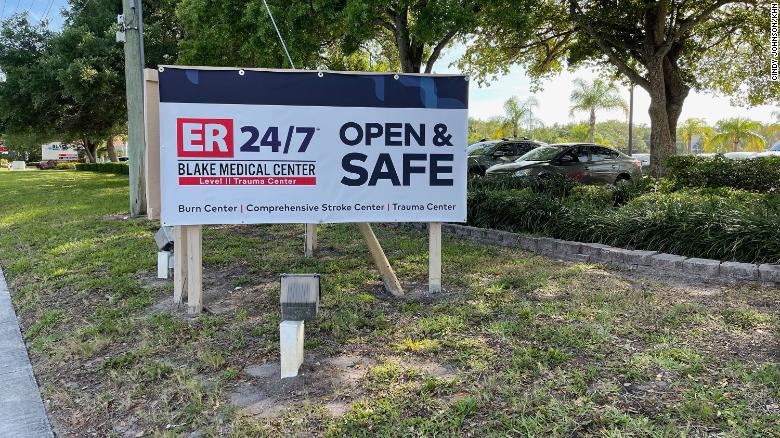 Cindy Johnson believes her husband, Steven, caught covid-19 from staff at Blake Medical Center in Bradenton, Florida, in November 2020. After his death, she asked a doctor who sees patients at the hospital to take down the big &quot;OPEN &amp; SAFE&quot; sign outside. (Cindy Johnson)