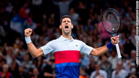 Djokovic celebrates victory against Hurkacz at the Paris Masters.