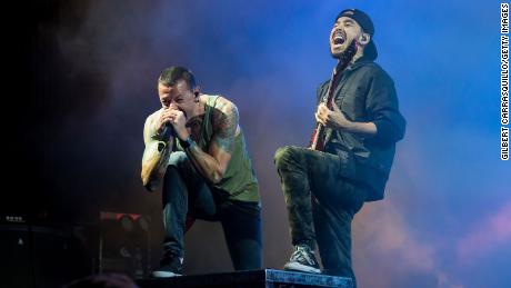 Musicians Chester Bennington and Mike Shinoda of Linkin Park, who once stopped a performance when a mosh pit got out of hand, perform during The Carnivores Tour on August 15, 2014 in Camden, New Jersey. 