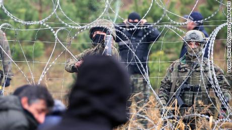 Polish police officers are detained in an area of ​​the border on Monday.