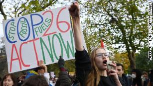 Young people call for fossil fuel non-proliferation treaty as delegates spar over coal, oil and gas