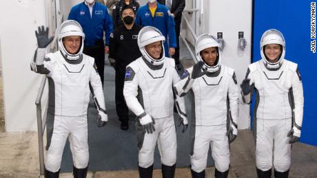 ESA (European Space Agency) astronaut Matthias Maurer, left, and NASA astronauts Tom Marshburn, second from left, Raja Chari, second from right, and Kayla Barron, right, wearing SpaceX spacesuits, are seen as they prepare to depart the Neil  A. Armstrong Operations and Checkout Building for Launch Complex 39A to board the SpaceX Crew Dragon spacecraft for the Crew-3 mission launch, Wednesday, Nov. 10, 2021, at NASA&#39;s Kennedy Space Center in Florida. NASA&#39;s SpaceX Crew-3 mission is the third crew rotation mission of the SpaceX Crew Dragon spacecraft and Falcon 9 rocket to the International Space Station as part of the agency&#39;s Commercial Crew Program. Chari, Marshburn, Barron, Maurer are scheduled to launch at 9:03 p.m. EST, from Launch Complex 39A at the Kennedy Space Center.  Photo Credit: (NASA/Joel Kowsky)