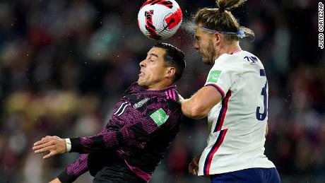 Mexico&#39;s Rogelio Funes Mori challenges for the ball against Walker Zimmerman.