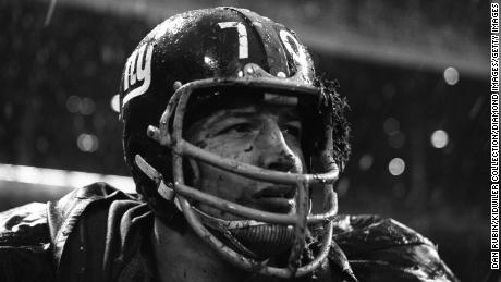 Linebacker Sam Huff of the New York Giants watches the action from the sidelines during a game on November 19, 1962 against the Philadelphia Eagles at the Yankee Stadium in New York