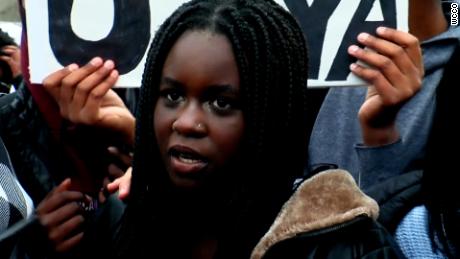 Nya Sigin attends a protest after a video of a racist slur was posted on social media.